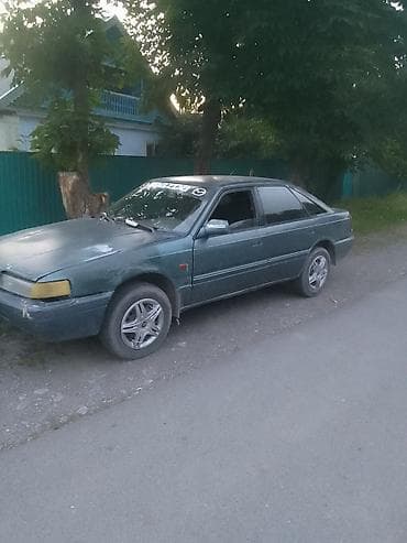 купить авто мазда трибют: Mazda 626: 1991 г., 2 л, Механика, Бензин, Хэтчбэк — 9