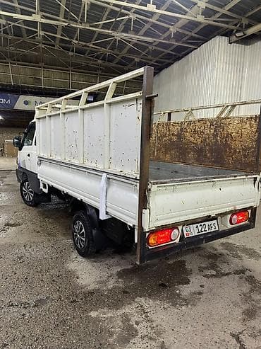 Грузовой мини‑самосвал Hyundai Porter (тип кузова — бортовой — 5