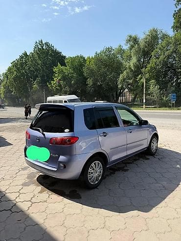 ниссан марч 1998: Mazda Demio: 2005 г., 1.3 л, Автомат, Бензин, Хэтчбэк — 4