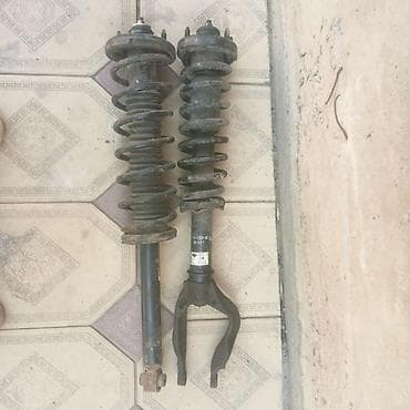 бакту долонотуу: Амортизаторлор комплекти Nissan 2005 г., Колдонулган, Оригинал, Германия — 1