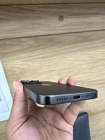 IPhone 15 Pro, Black Titanium, 86 % — 4