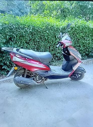 Продаю скутер китайский TOYO M-12.двух местный,заводится с ключа и с