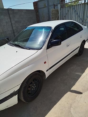 mazda 3 2007: Toyota Carina E: 1996 г., 1.6 л, Механика, Бензин, Седан — 2