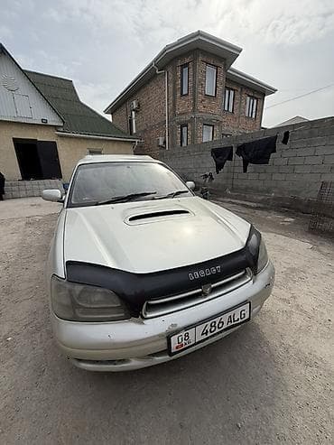 форестер sg: Subaru Legacy: 1998 г., 2 л, Автомат, Универсал — 10