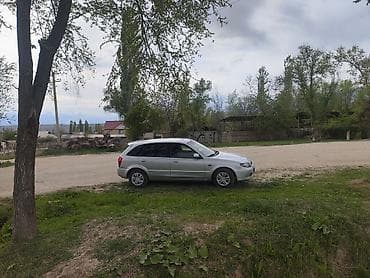 Mazda Familia: 2003 г., 1.6 л, Кол менен иштөөчү, Бензин, Универсал — 9