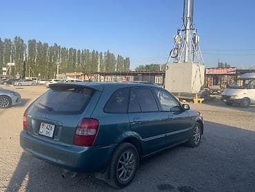 Транспорт: Mazda 323: 2003 г., 1.6 л, Автомат, Бензин, Универсал — 2