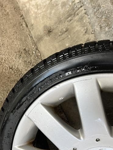 Шины и диски: Литой диск Nissan с шиной Hankook - Оригинальный легкосплавный диск — 4