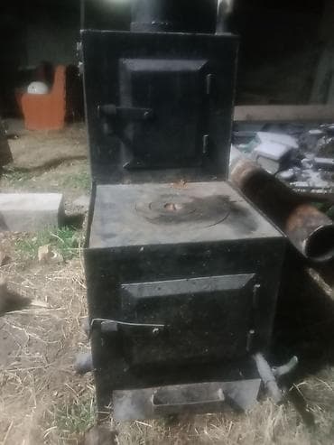 Буржуйки: Металлическая печь-буржуйка с варочной поверхностью. Описание: - — 2