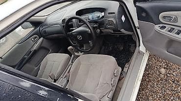 chevrolet kamaro: Mazda Familia: 2002 г., Автомат, Бензин, Седан — 3