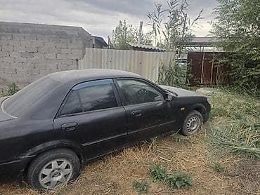 mazda 323 седан: Mazda Familia: 2003 г., Автомат, Седан — 6