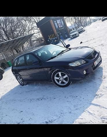 b4 subaru: Mazda 323: 2003 г., Автомат, Универсал — 1