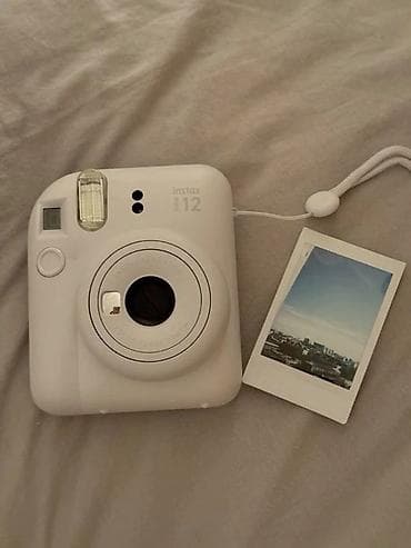 Техника и электроника: Fujifilm Instax Mini 12 — мгновенная камера белого цвета. Основные — 2