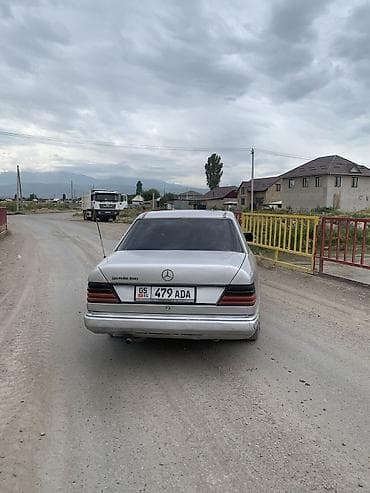 сапог мерс 410: Mercedes-Benz W124: 1990 г. — 6