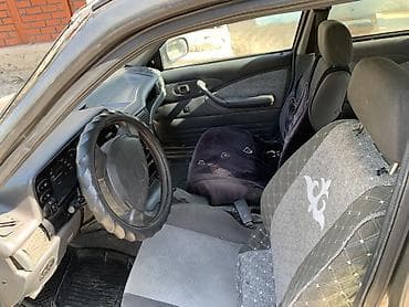 Унаа: Daewoo Nexia: 2004 г., Кол менен иштөөчү, Седан — 3