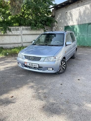 бар авто: Mazda Demio: 2001 г., 1.3 л, Кол менен иштөөчү, Бензин, Хетчбек — 4