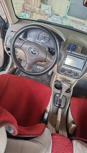 мазда 333: Mazda 323: 2003 г., 2 л, Автомат, Бензин, Седан — 1