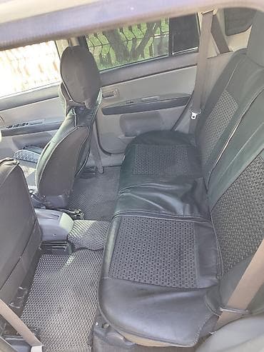 задний бампер на 124: Mazda Demio: 2003 г., 1.3 л, Автомат, Бензин, Хэтчбэк — 8