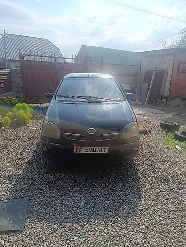салон машина: Nissan Almera Tino: 2003 г., 1.8 л, Механика, Бензин, Хэтчбэк — 1
