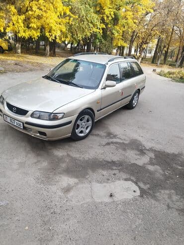 срочно продаю в связи с переездом: Mazda 626: 1998 г., 2 л, Бензин, Универсал — 1