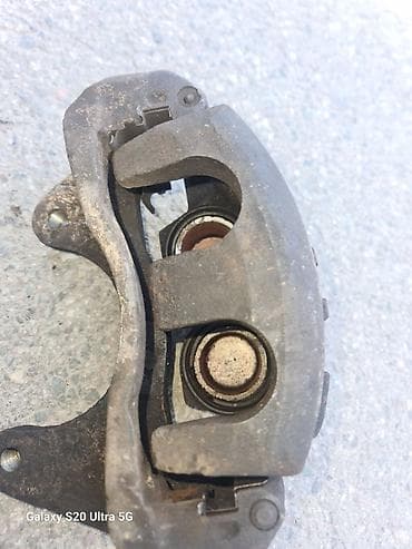 altezza 2003: Передний левый суппорт Kia 2012 г., Б/у, Оригинал — 1