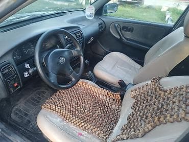 mini copper: Nissan Primera: 1992 г., 1.8 л, Механика, Бензин, Седан — 6