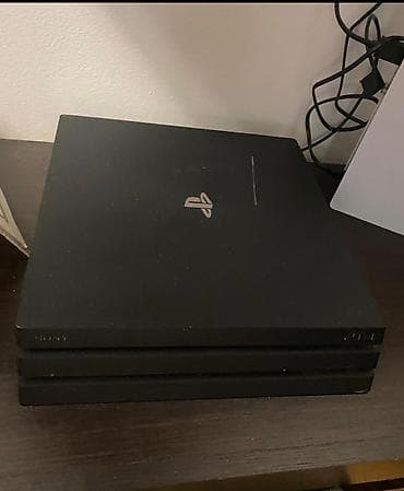 Игровая консоль Sony PlayStation 4 Pro (черная) - Версия Pro с