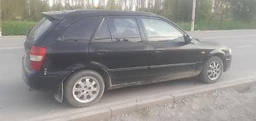Mazda 323: 2000 г., 1.8 л, Механика, Бензин, Универсал