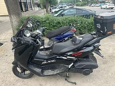 один: В продаже новый скутер премиум класса ZMAX, один из больших скутеров — 7