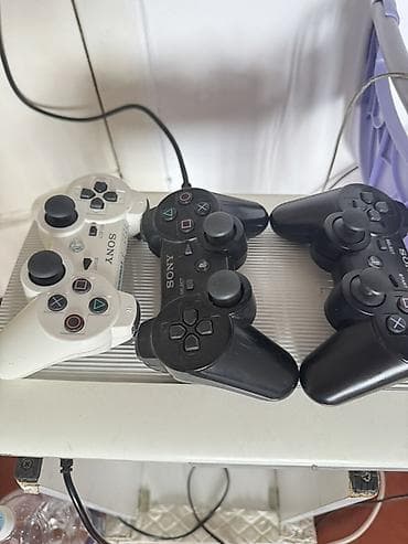 Игровая приставка Sony PlayStation 3 Super Slim (белая) с комплектом