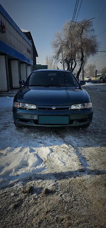 Транспорт: Mazda 626: 1993 г., 2 л, Механика, Бензин, Седан — 3