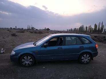 w124 124: Mazda 323: 1999 г., 1.5 л, Механика, Бензин, Универсал — 8