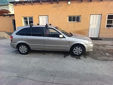 gs300 160: Mazda 323: 2002 г., 1.5 л, Механика, Бензин, Универсал — 5