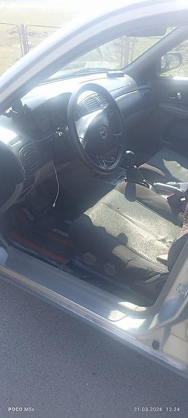 chery tiggo: Mazda 323: 2003 г., 1.6 л, Ручные, Бензин, Хэтчбэк — 3