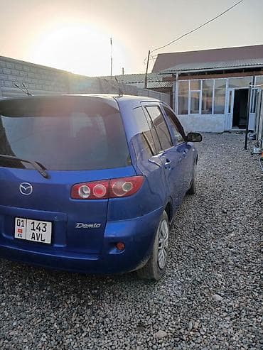 фары на гольф 3: Mazda Demio: 2003 г., Автомат, Бензин, Хэтчбэк — 4