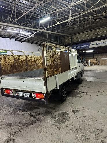 Грузовой мини‑самосвал Hyundai Porter (тип кузова — бортовой — 4