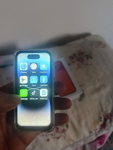 купить пиксель 10: Мини-смартфон в стиле iPhone, серого цвета, с прозрачном. внутри — 5