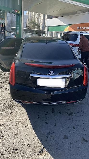 Транспорт: Cadillac : 2013 г., 2 л, Автомат, Бензин, Седан — 2