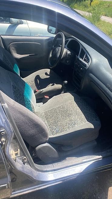 Продажа авто: Daewoo Lanos: 2009 г., 1.3 л, Механика, Бензин, Седан — 6