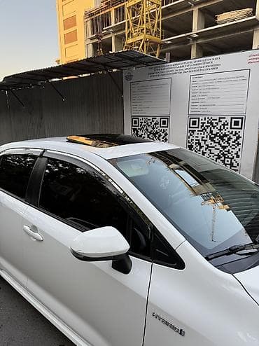 byd e2 2023: Toyota Corolla: 2020 г., Гибрид, Седан — 5