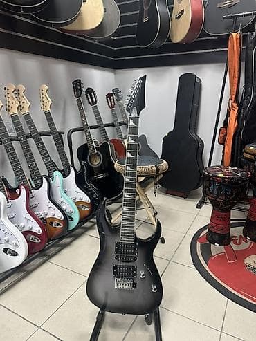 Электрогитара в комплекте струны, плотный чехол, 3 медиатора, ремень at lalafo.kg Электрогитара в комплекте струны, плотный чехол, 3 медиатора, ремень