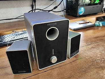 Microlab M-666 Суммарная мощность: 32 Вт (сабвуфер 14 Вт + две — 4