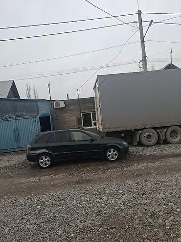 mini copper: Mazda 323: 2002 г., 1.6 л, Механика, Универсал — 1