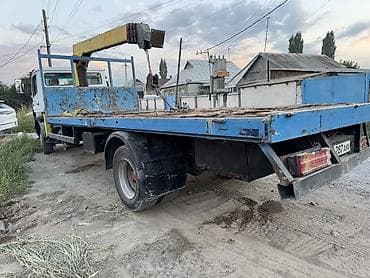 ауман тягач: Манипулятор, Mercedes-Benz — 3