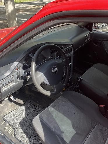 Daewoo Nexia: 2009 г., 1.6 л, Механика, Бензин, Седан