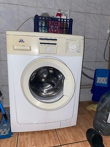 Стиральная машина Атлант, фронтальная загрузка. Характеристики и