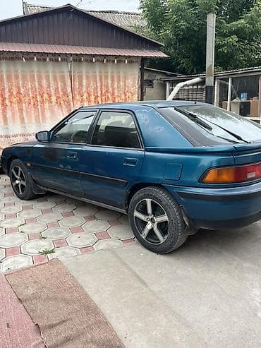 Транспорт: Mazda 323: 1992 г., 1.6 л, Механика, Бензин, Хэтчбэк — 4