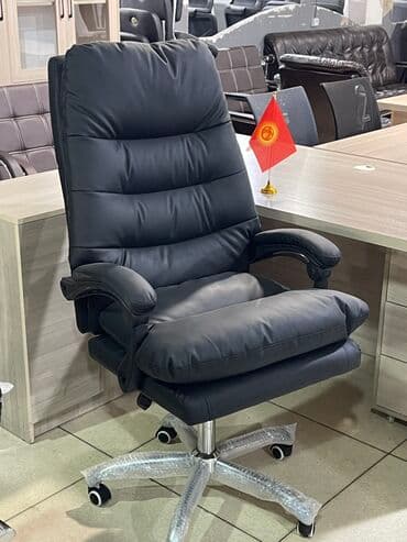реклайнеры: Офисное кресло руководителя с выдвижной подставкой для ног позволяет — 4