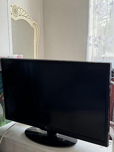 tab a: Телевизор LG с диагональю около 32". Плоская матрица, тонкая рамка — 1