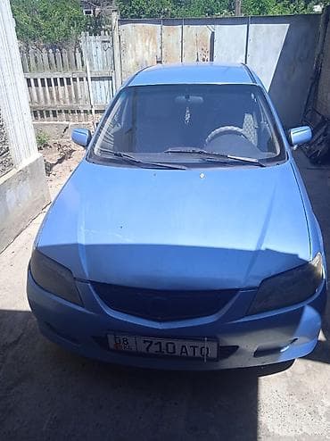 мтз 1021: Mazda 323: 2002 г., 1.6 л, Механика, Бензин, Хэтчбэк — 3