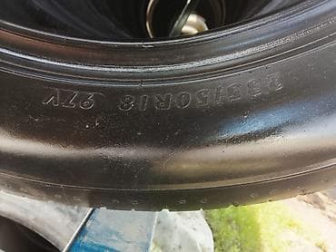 Транспорт: Представляем автомобильную шину размером 235/50R18. Эта шина имеет — 2